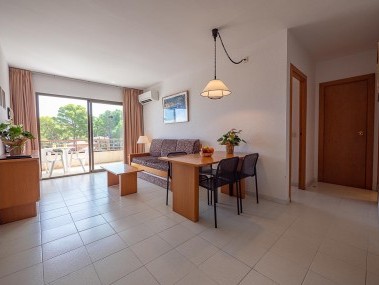 Salon avec coin repas - Golf Beach Residence