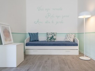 Wohn- und Schlafzimmer  - Reka-Ferienresort Golfo del Sole