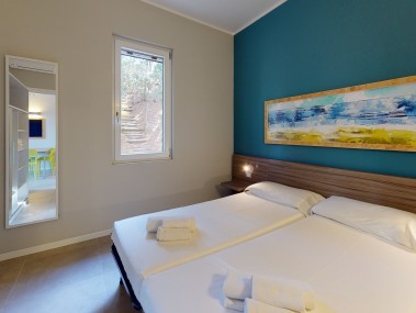 Schlafzimmer - Ferienwohnung - Golfo del Sole