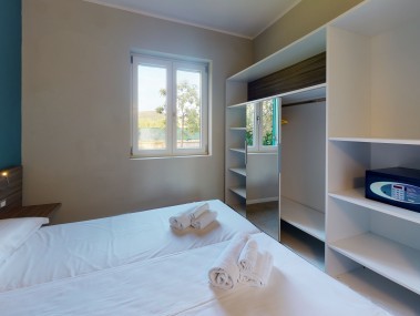 Schlafzimmer - Ferienwohnung - Golfo del Sole