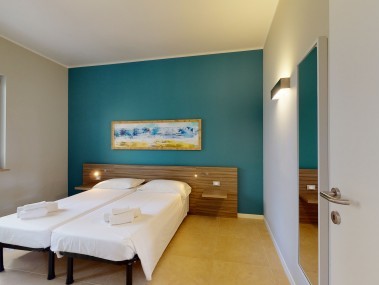 Schlafzimmer - Ferienwohnung - Golfo del Sole