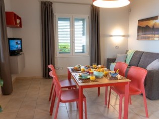 Wohnzimmer mit Essbereich - Golfo del Sole