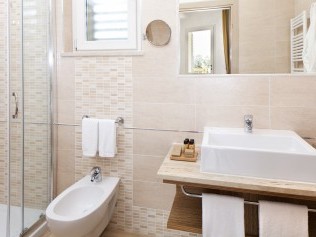 Badezimmer - Golfo del Sole Hotel