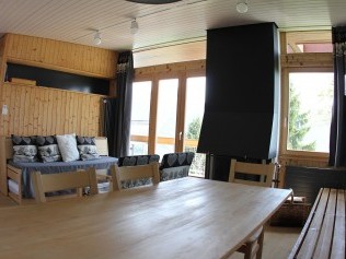 Wohnzimmer mit Essbereich - Leysin Lodge