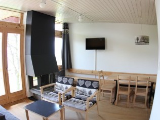 Wohnzimmer mit Essbereich - Leysin Lodge