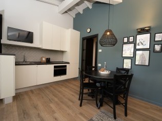 Wohnzimmer mit Essbereich - Park Residence Il Gabbiano