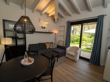 Salon avec coin repas - Park Residence Il Gabbiano