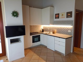 Wohnzimmer mit Essbereich - Park Residence Il Gabbiano