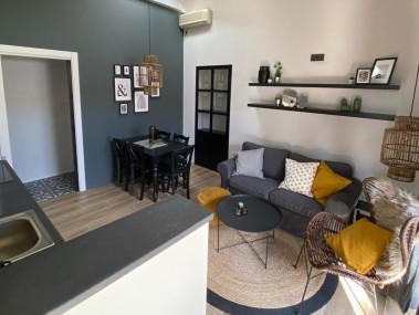 Salon avec coin repas - Park Residence Il Gabbiano