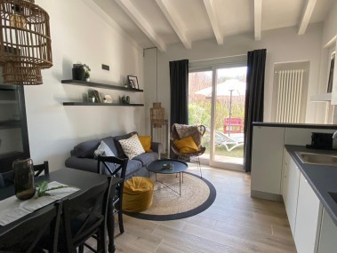 Salon avec coin repas - Park Residence Il Gabbiano