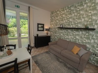 Wohnzimmer mit Essbereich - Park Residence Il Gabbiano