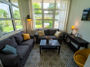 Wohnzimmer mit Essbereich - Park Residence Il Gabbiano