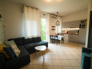 Küche mit Wohnzimmer - Park Residence Il Gabbiano