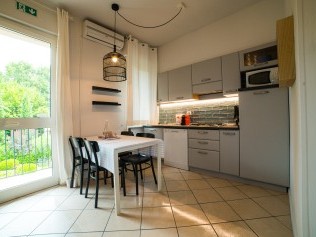 Küche mit Wohnzimmer - Park Residence Il Gabbiano