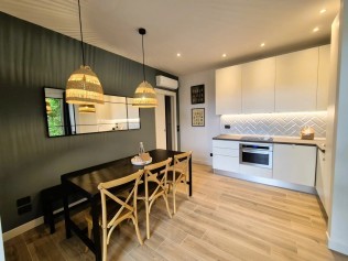 Wohnzimmer mit Essbereich - Park Residence Il Gabbiano