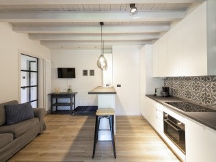 Küche mit Wohnzimmer - Park Residence Il Gabbiano