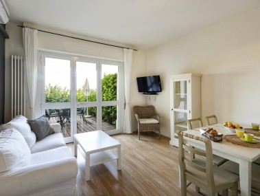Salon avec coin repas - Park Residence Il Gabbiano