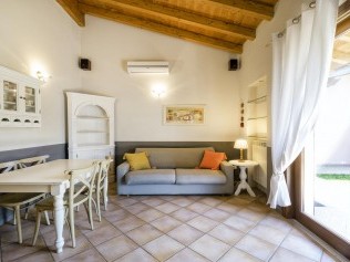 Wohnzimmer mit Essbereich - Park Residence Il Gabbiano