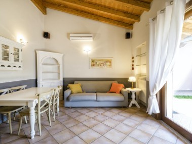 Wohnzimmer mit Essbereich - Park Residence Il Gabbiano