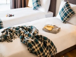 Schlafzimmer - Peaks Place Apartments