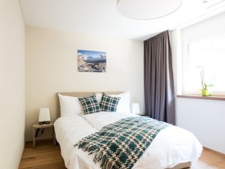 Schlafzimmer - Peaks Place Apartments