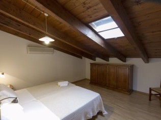 Schlafzimmer - Podere Monte Sixeri Residenze di Campagne