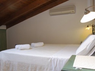 Schlafzimmer - Podere Monte Sixeri Residenze di Campagne