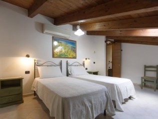 Schlafzimmer - Podere Monte Sixeri Residenze di Campagne