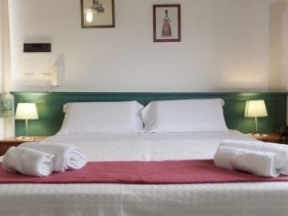 Schlafzimmer - Podere Monte Sixeri Residenze di Campagne