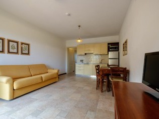 Salon avec coin repas - Poggio all'Agnello