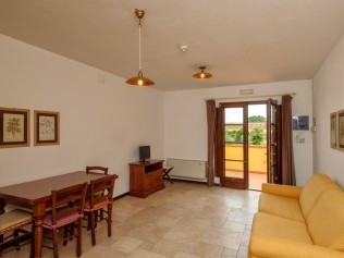 Salon avec coin repas - Poggio all'Agnello