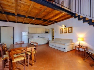 Salon avec coin repas - Poggio all'Agnello