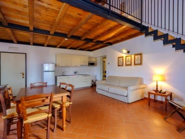 Wohnzimmer mit Essbereich - Poggio all'Agnello