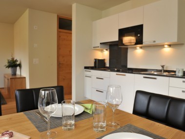 Küche mit Essbereich - PRIVÀ Alpine Lodge