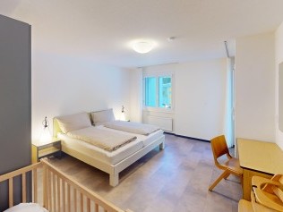 Schlafzimmer - Reka-Feriendorf Bergün