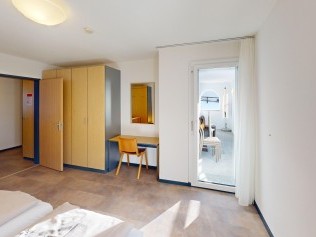 Schlafzimmer - Reka-Feriendorf Bergün