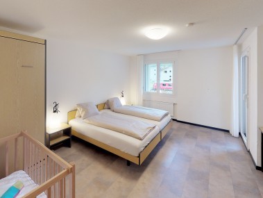 Schlafzimmer - Reka-Feriendorf Bergün