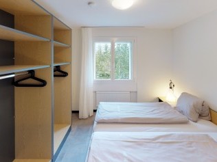 Schlafzimmer - Reka-Feriendorf Bergün