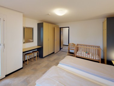 Schlafzimmer - Reka-Feriendorf Bergün