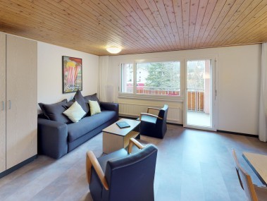 Wohnzimmer mit Essbereich - Reka-Feriendorf Bergün