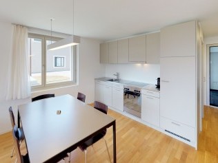 Kitchen with dining area - Reka Holiday Village Blatten