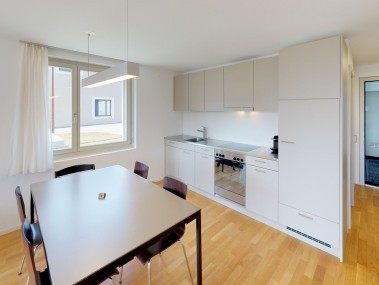 Kitchen with dining area - Reka Holiday Village Blatten