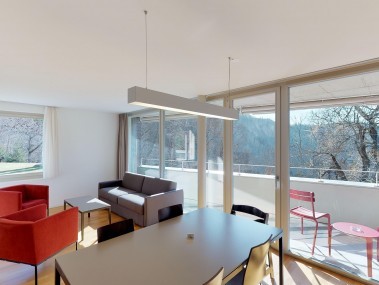 Living room with dining area  - Reka Holiday Village Blatten