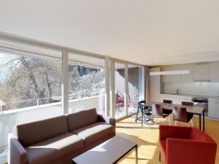 Living room with dining area  - Reka Holiday Village Blatten