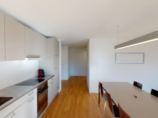 Kitchen with dining area - Reka Holiday Village Blatten