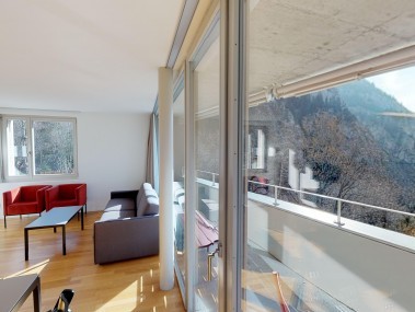 Living room with dining area - Reka Holiday Village Blatten