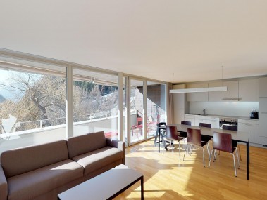 Living room with dining area - Reka Holiday Village Blatten