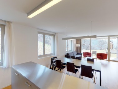Living room with dining area - Reka Holiday Village Blatten