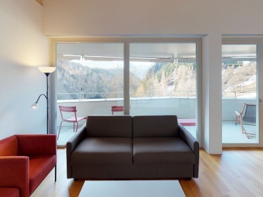 Living room with dining area - Reka Holiday Village Blatten