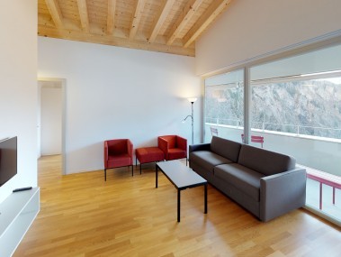 Living room with dining area - Reka Holiday Village Blatten